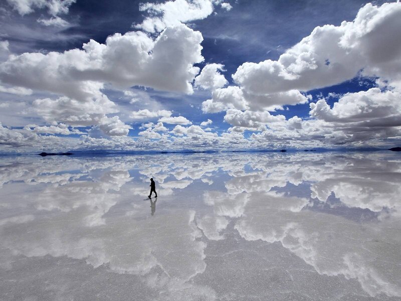 Person Walking on Salt Flat — White, Serene, Afternoon