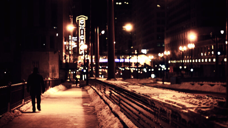 Person Walking on Sidewalk — Black