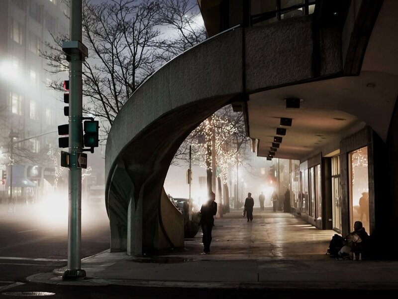 Person Walking on Sidewalk — Gray, Dramatic