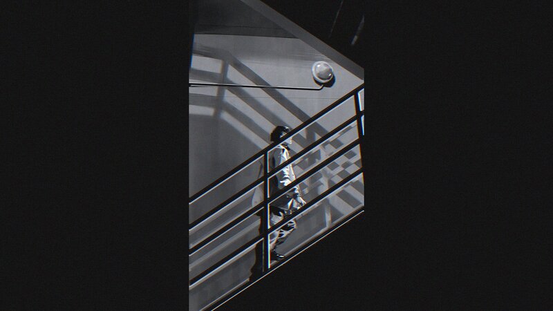 Person Walking on Staircase