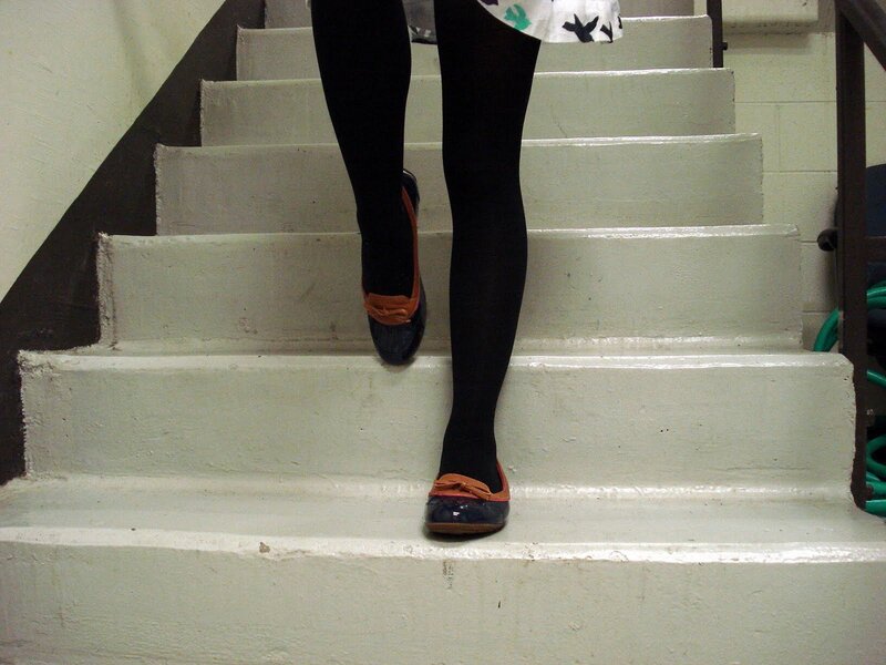 Person Walking on Stairs