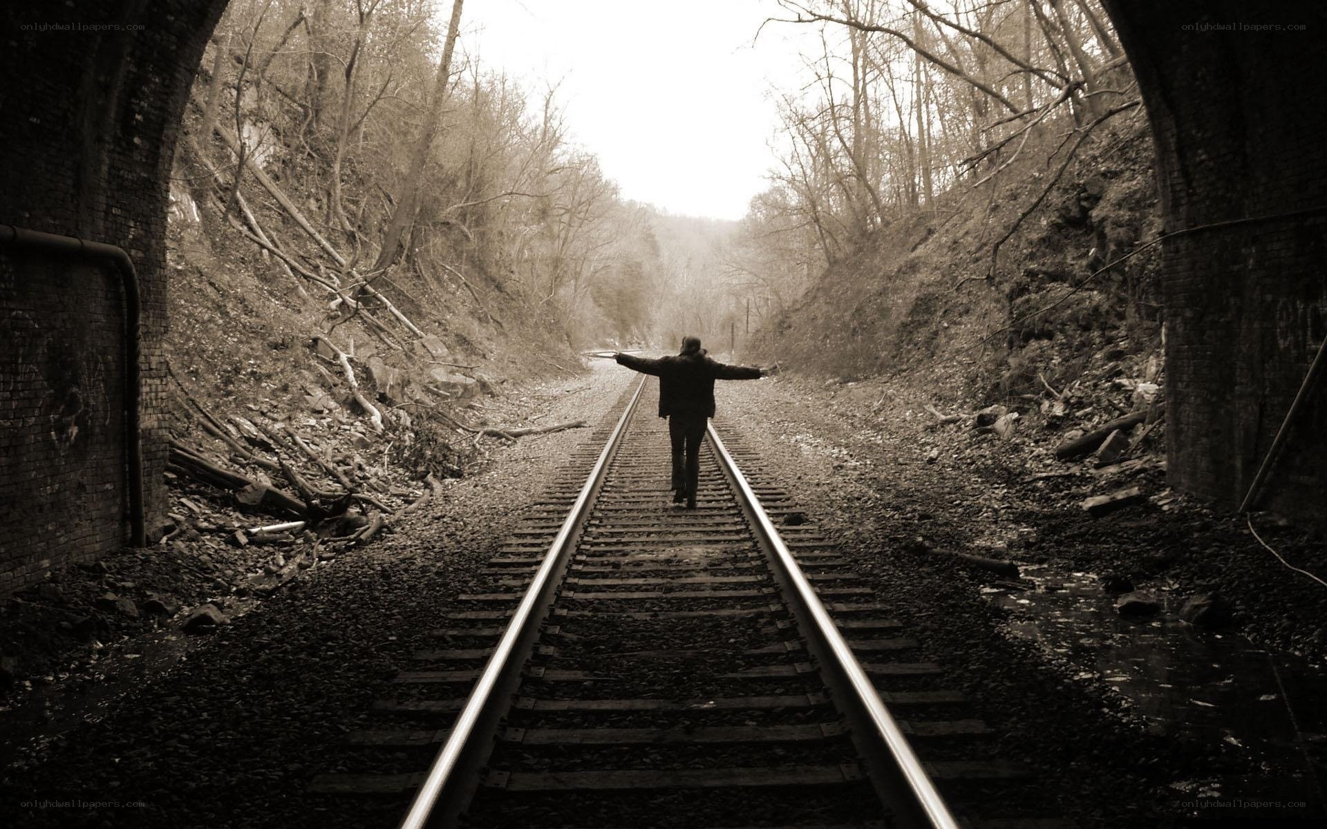 Person walking on train tracks