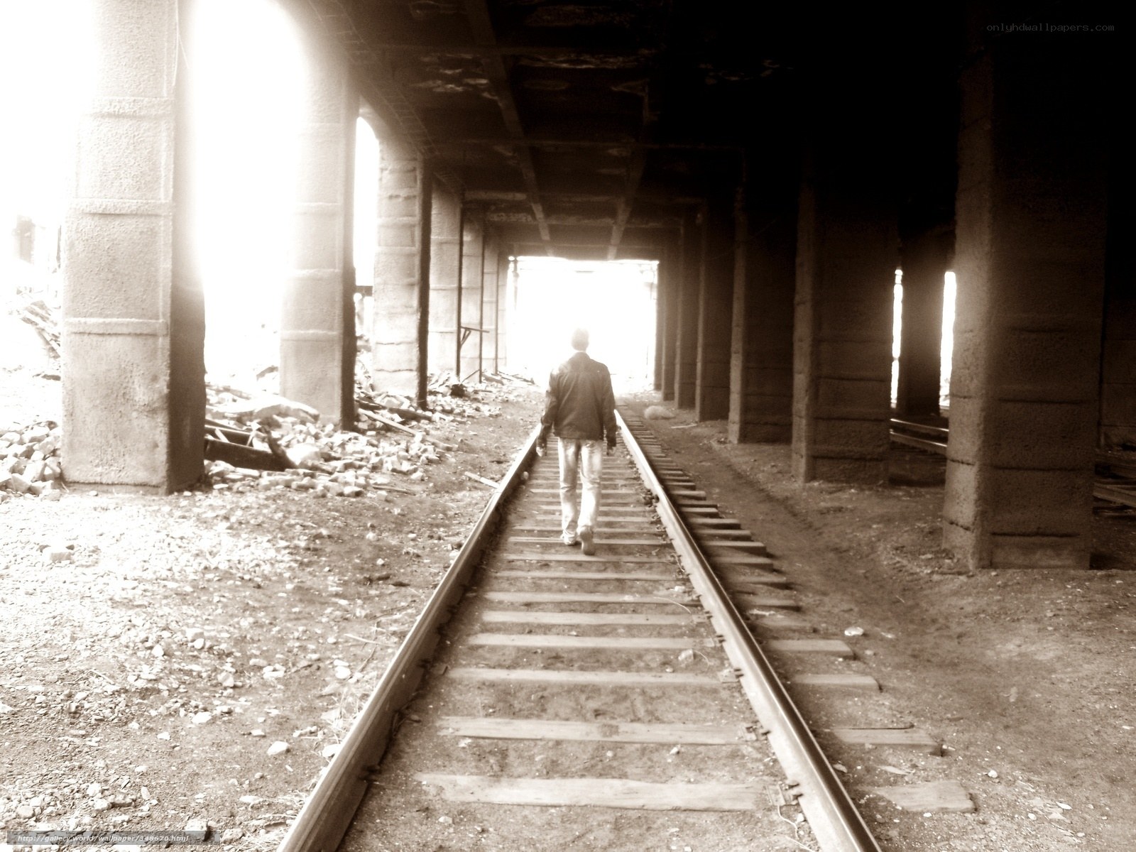 Person walking on train tracks