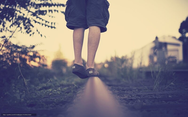 Person Walking on Train Tracks — Brown, Calm