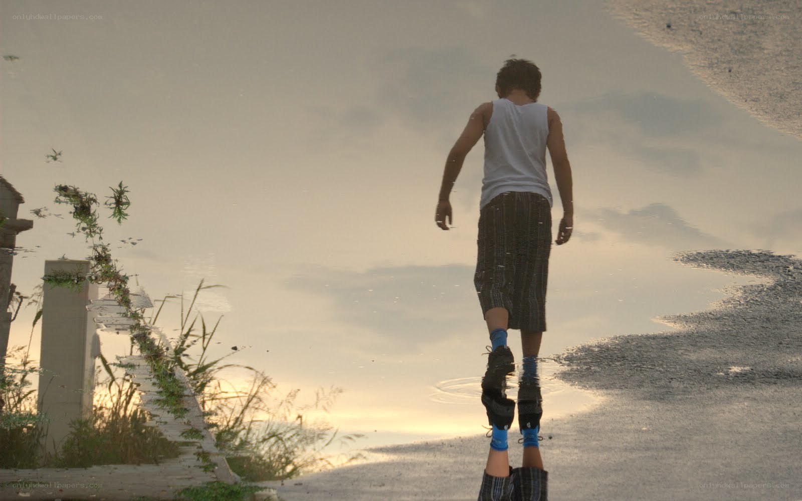 Person walking on water reflection