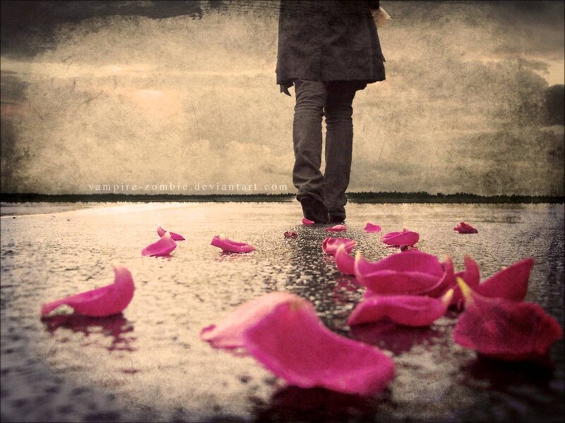 Person Walking on Wet Ground