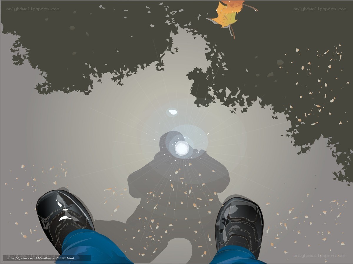 person walking on wet pavement