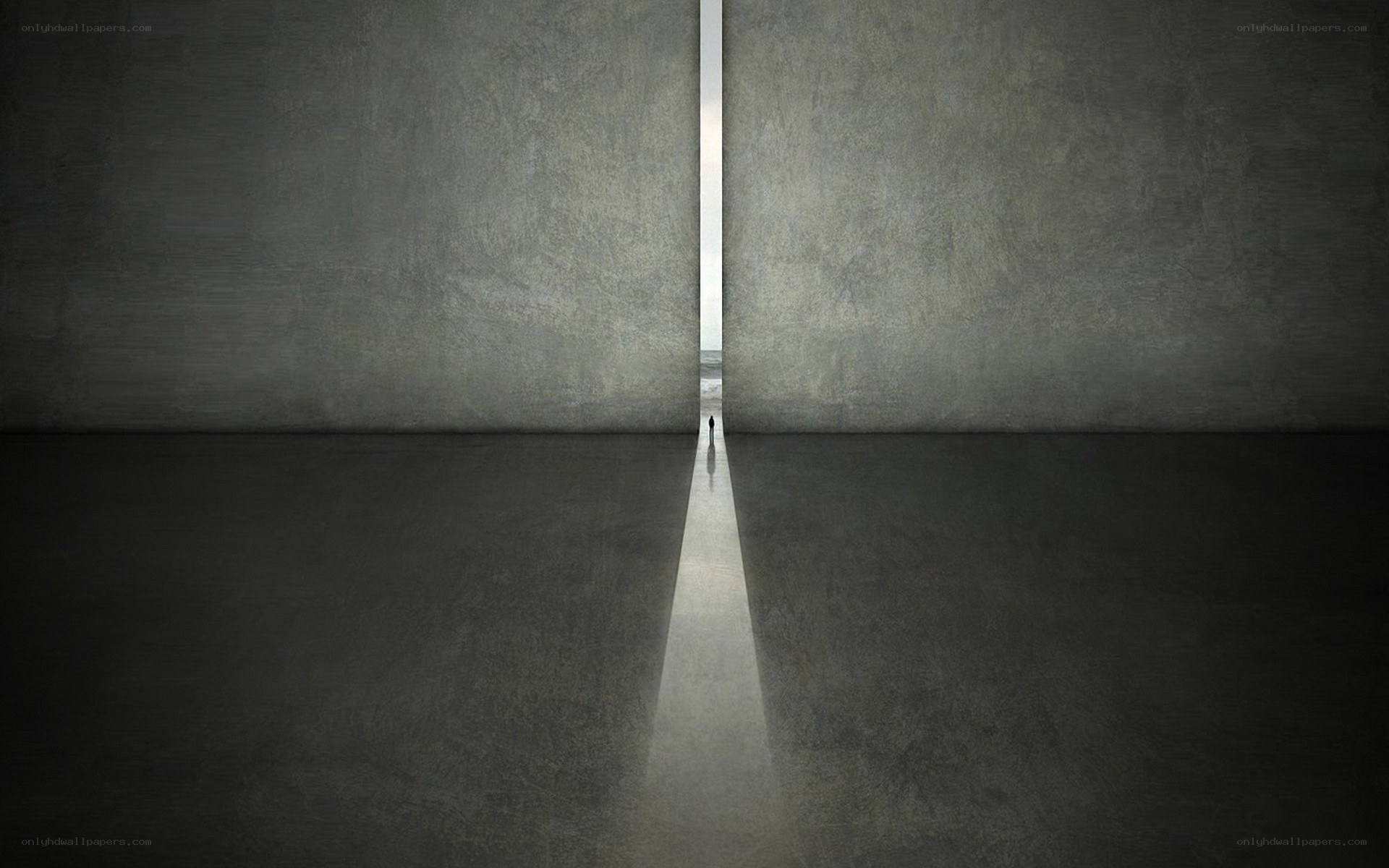 person walking through a narrow opening