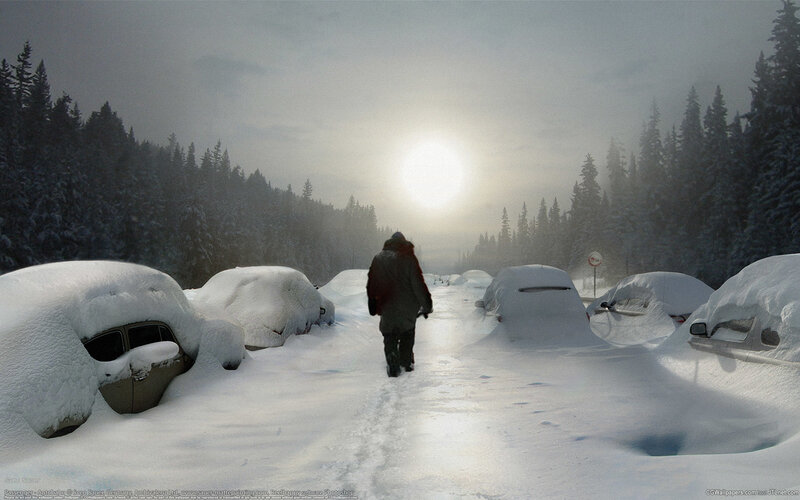 Person walking through snow-covered parking lot