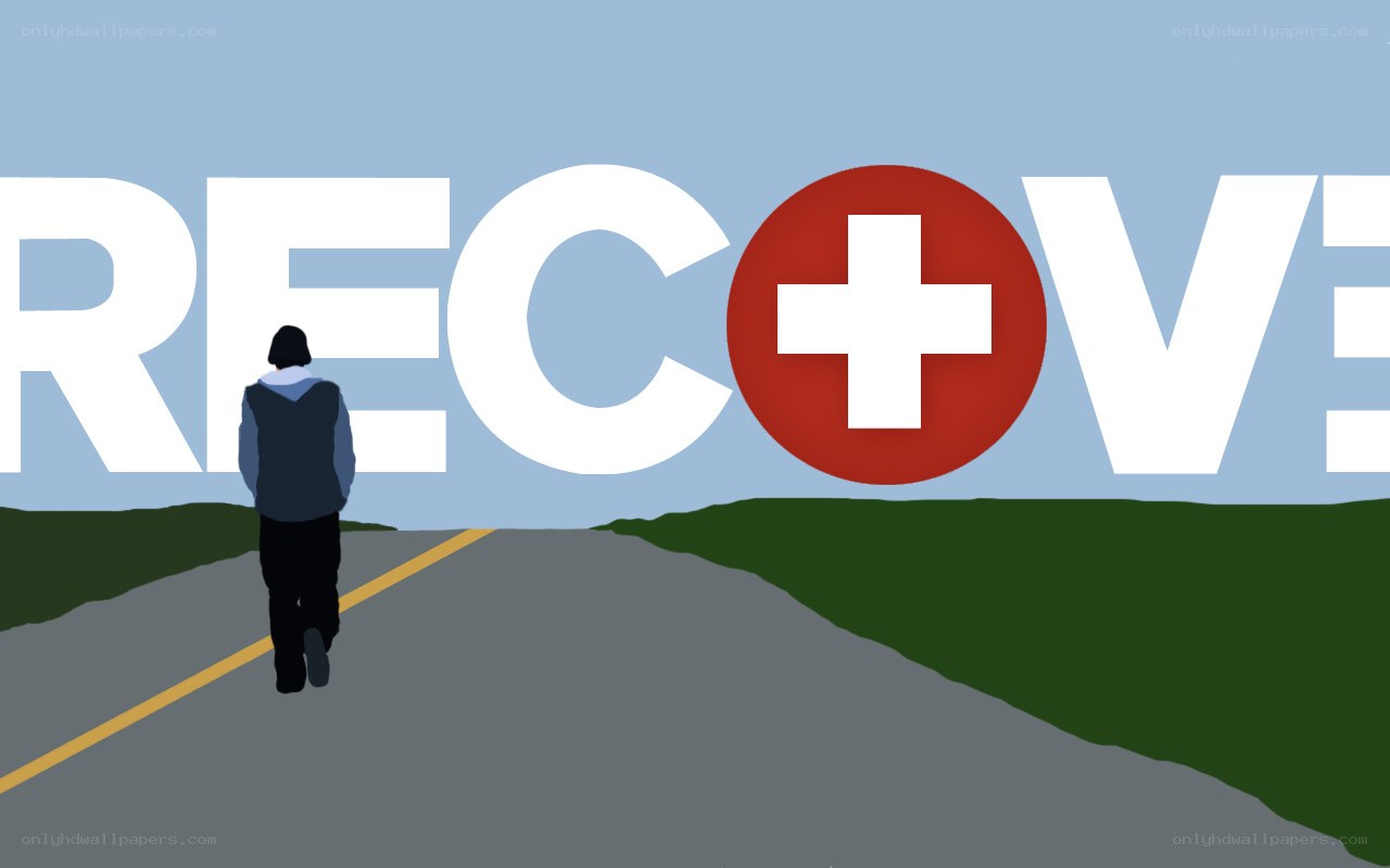 person walking toward recover sign