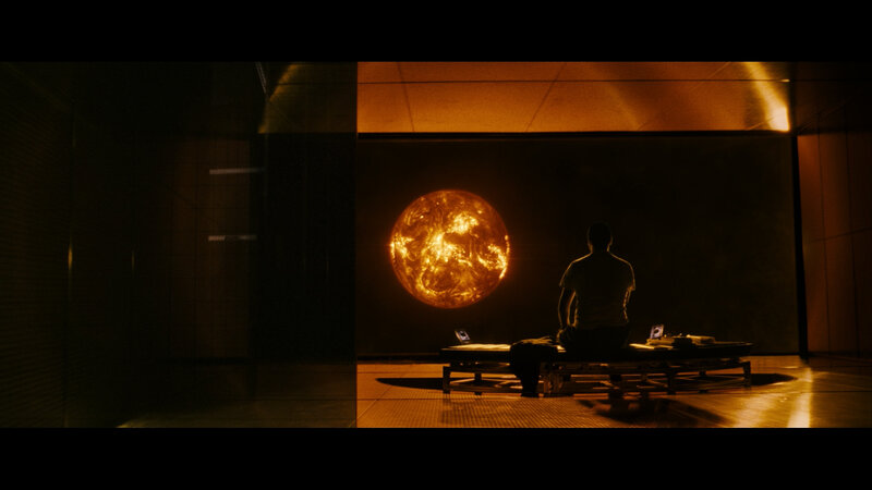person watching sun in dark room