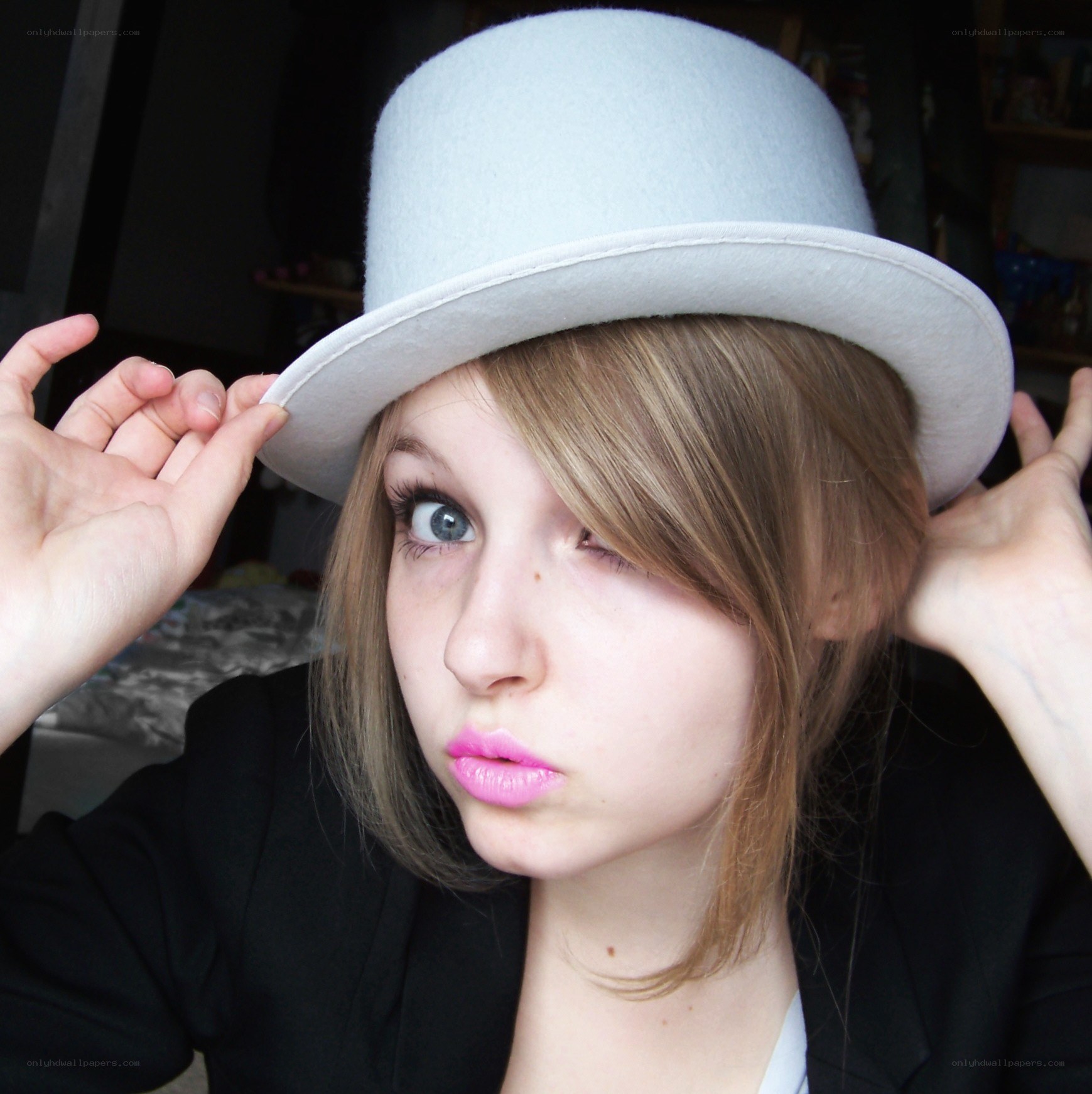 person wearing a white hat