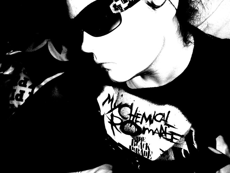 person wearing band t-shirt