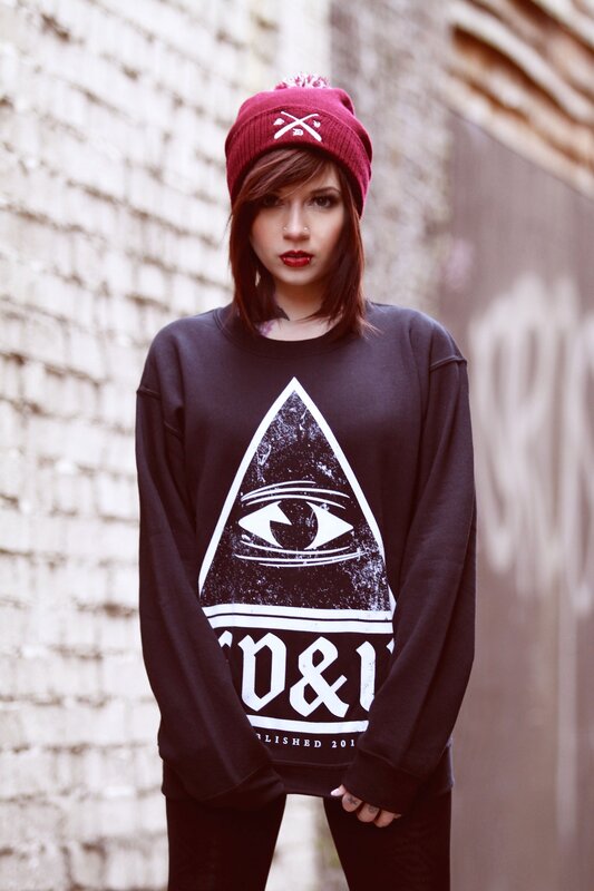 person wearing beanie and sweatshirt
