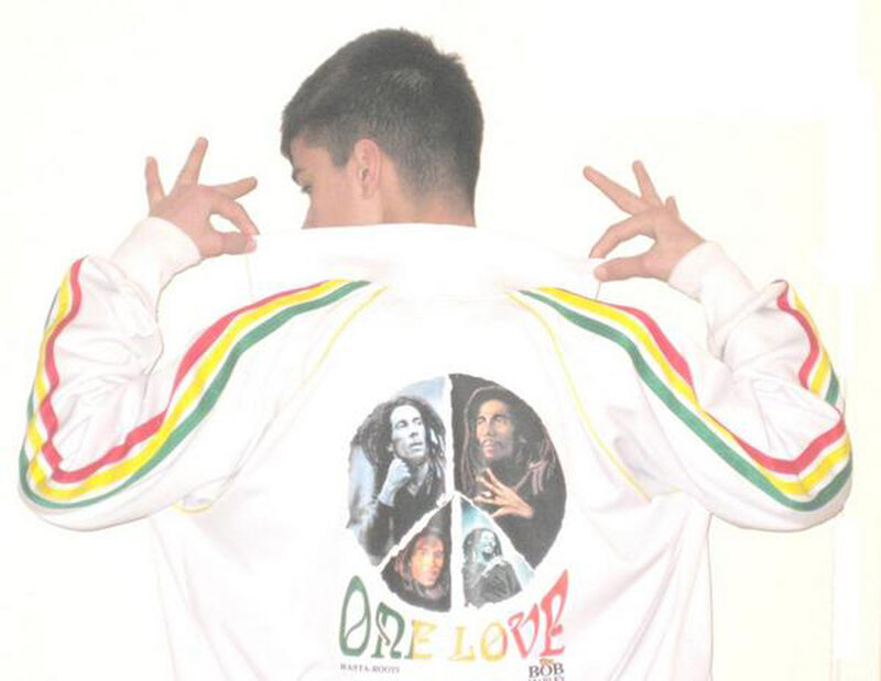 person wearing bob marley jacket
