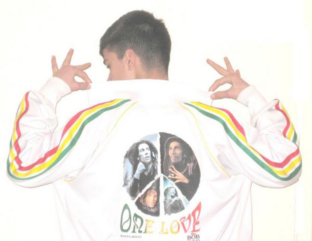 person wearing bob marley jacket