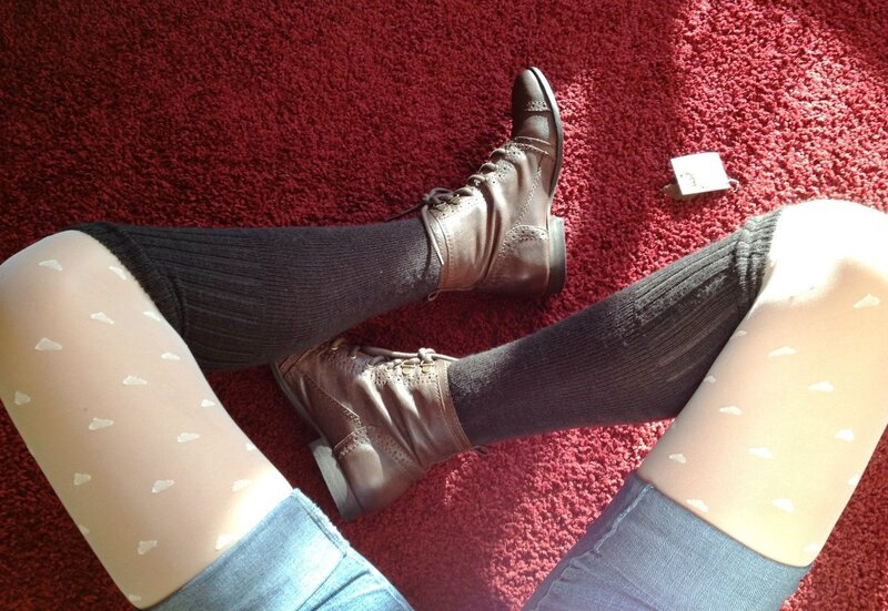 person wearing boots and socks