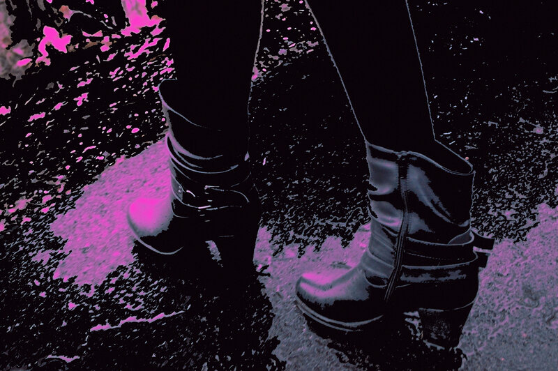 Person Wearing Boots — Black