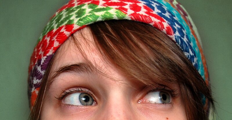 person wearing colorful headband