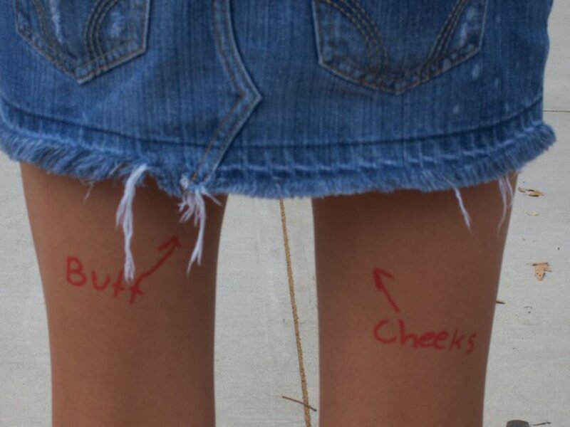 Person Wearing Denim Skirt