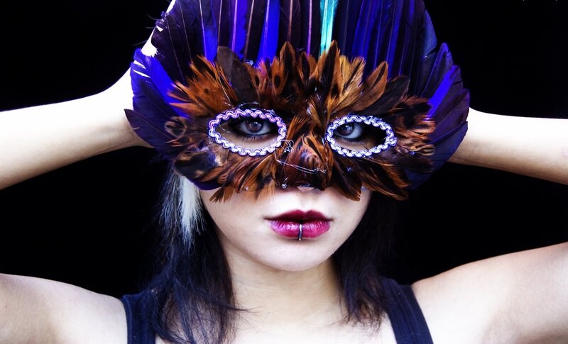 Person Wearing Feather Mask — Black