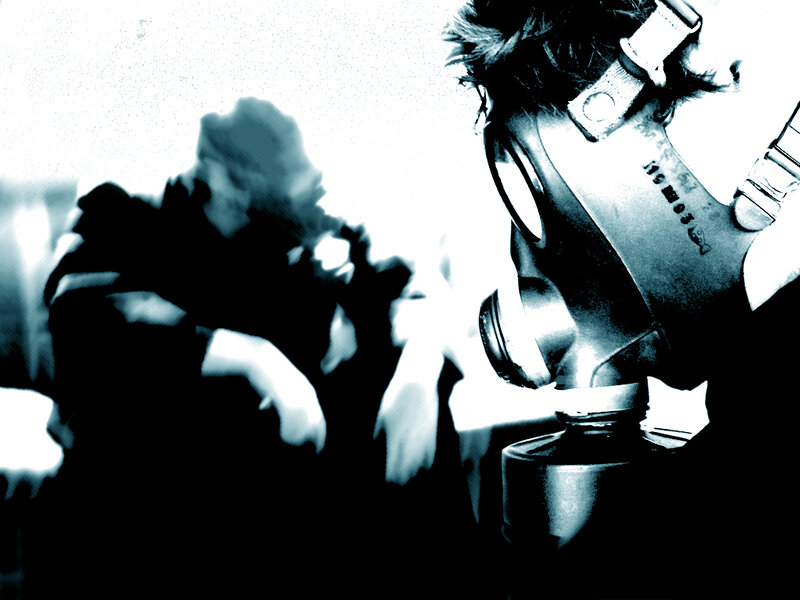 Person Wearing Gas Mask — Black, Dramatic, Photograph, Gas Mask, Blurry Figure