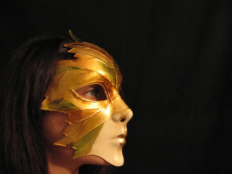 Person Wearing Golden Mask