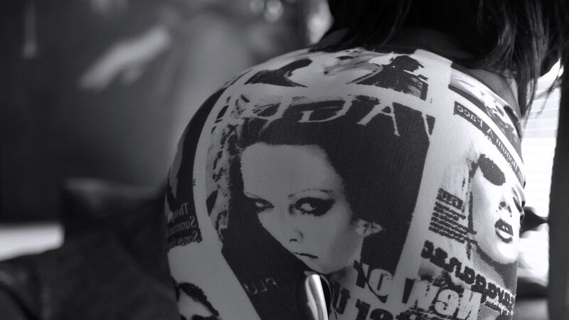 person wearing graphic t-shirt
