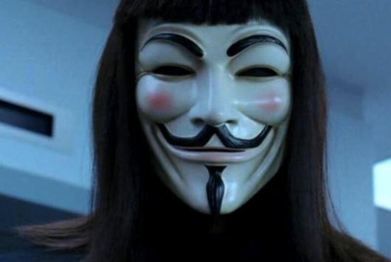 person wearing guy fawkes mask