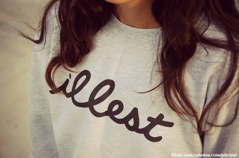 person wearing 'illegally' sweatshirt