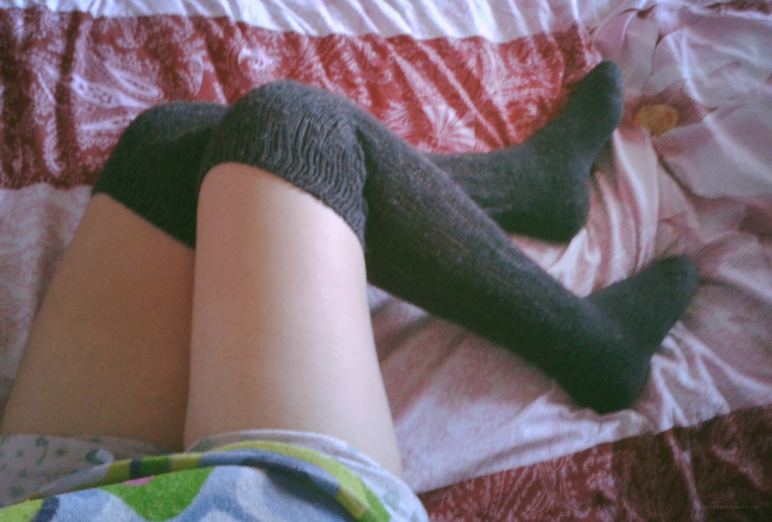 person wearing knee-high socks