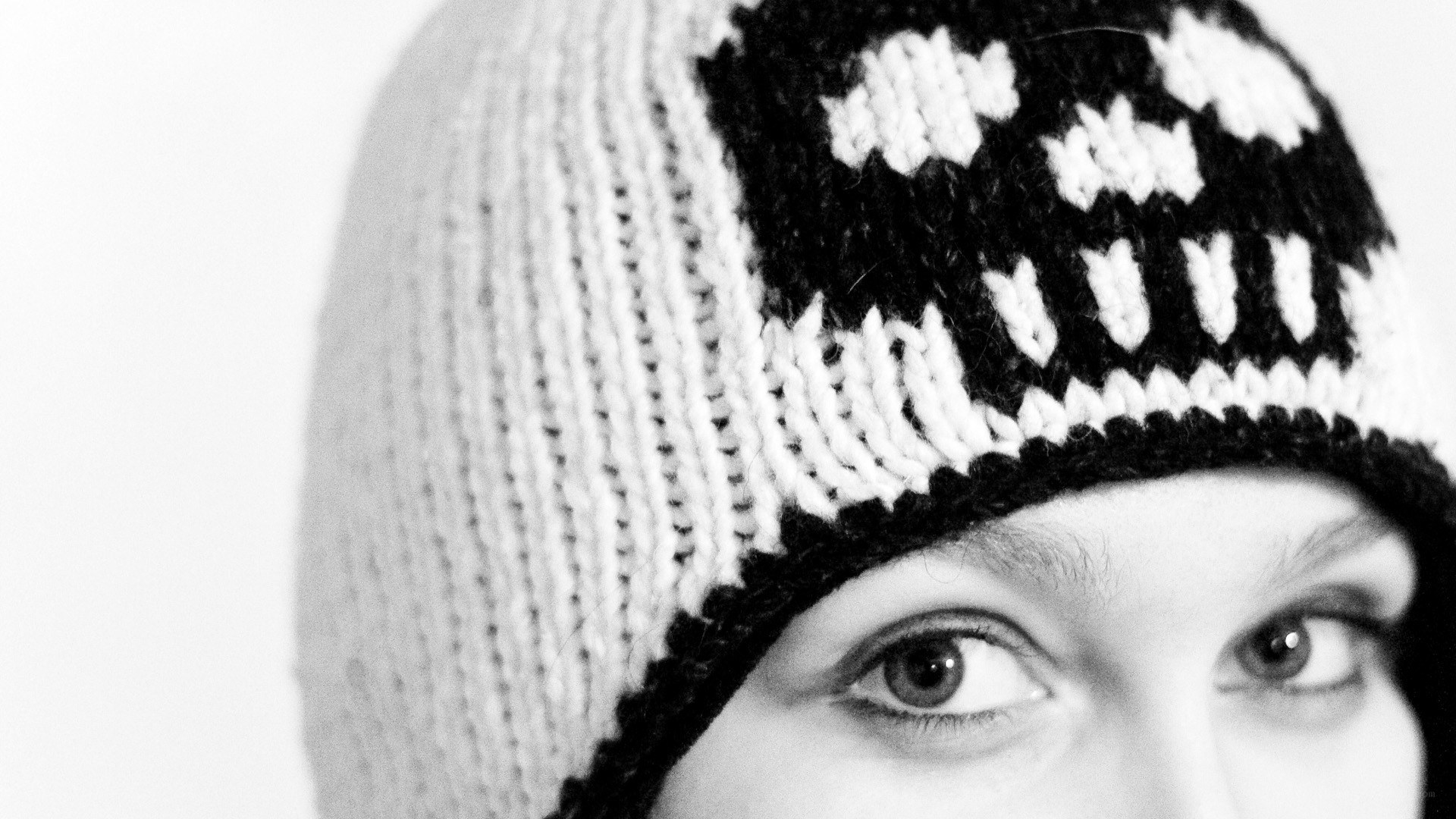 person wearing knitted hat