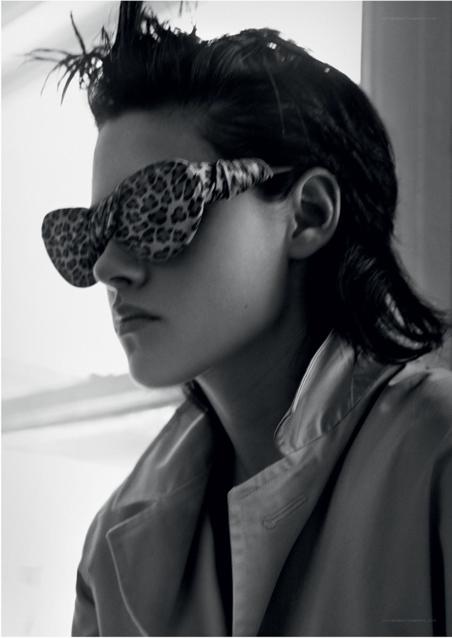 person wearing leopard-print sunglasses