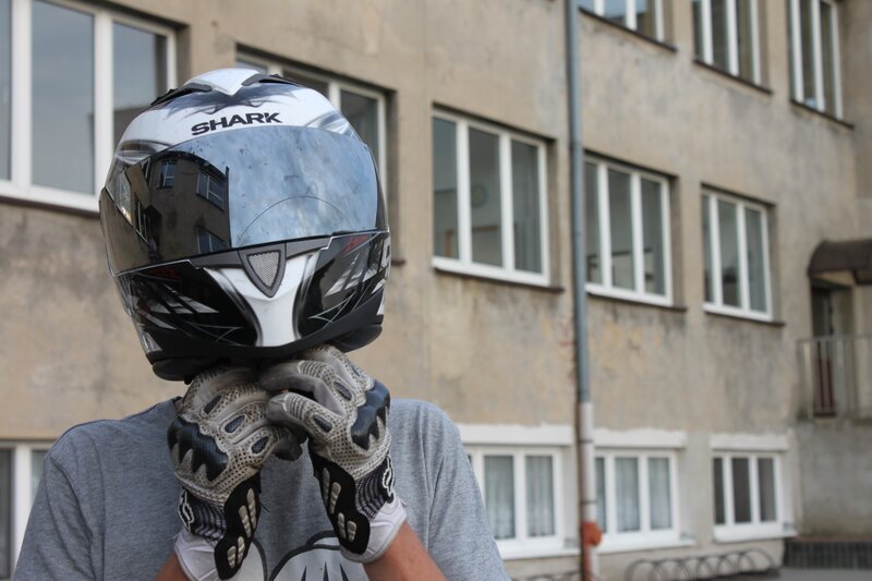 person wearing motorcycle helmet