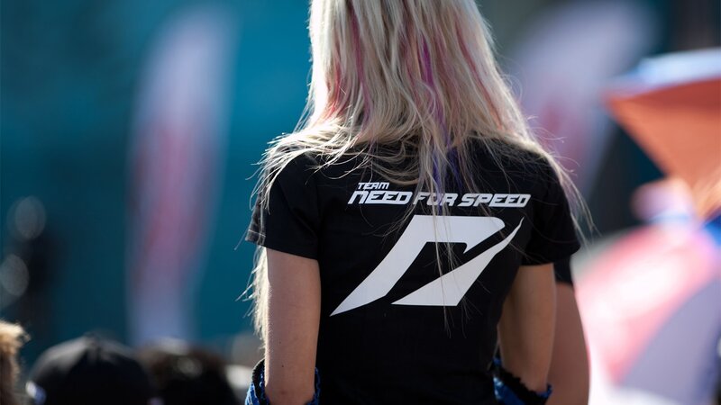 person wearing need for speed shirt