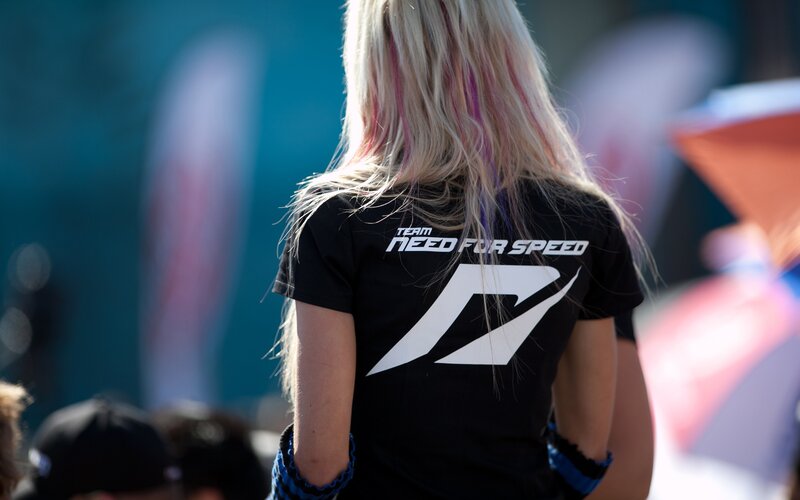 person wearing need for speed shirt
