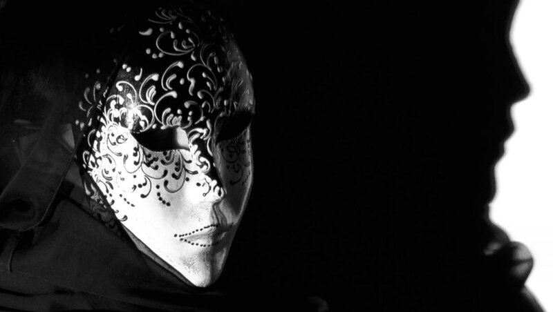 Person Wearing Ornate Mask