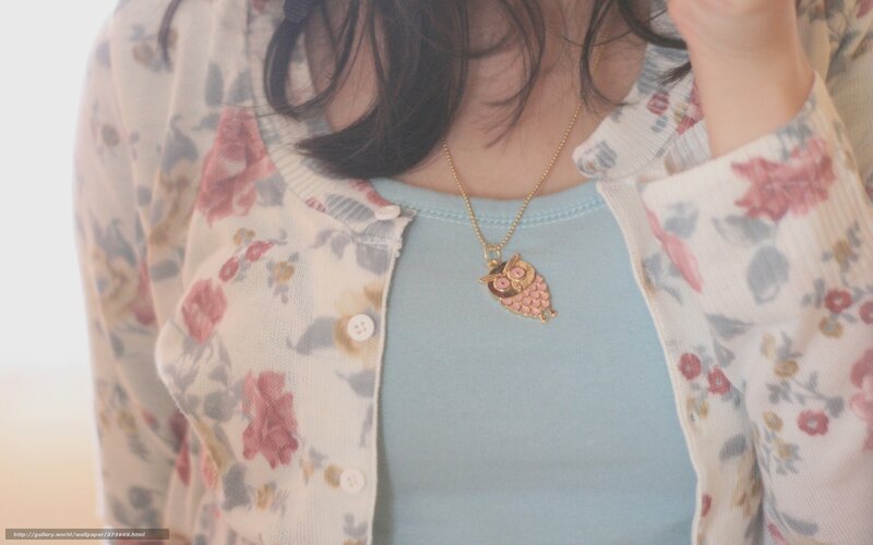 Person Wearing Owl Necklace — Blue