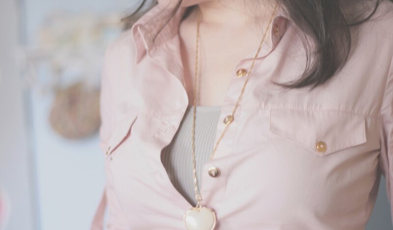 person wearing pink shirt