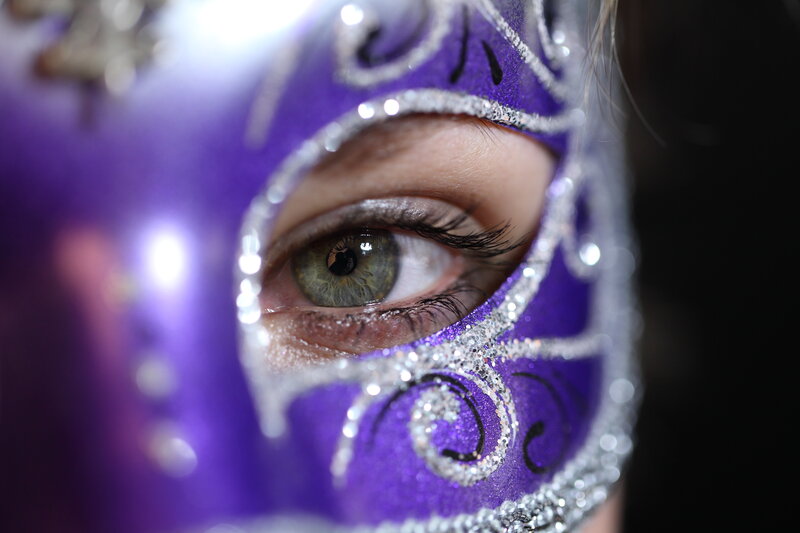 Person Wearing Purple Mask