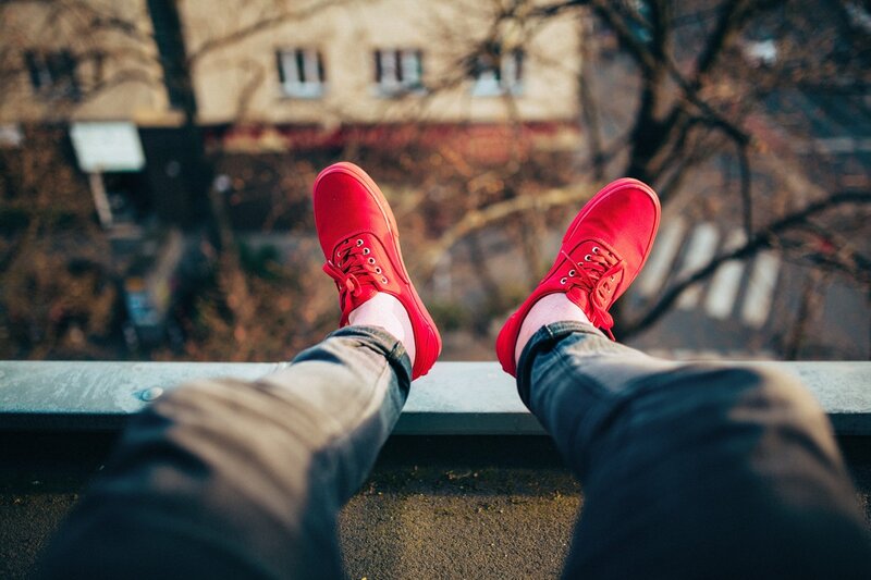 Person Wearing Red Shoes — Relaxed
