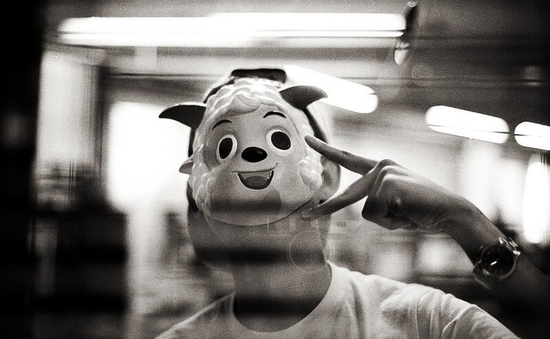 person wearing sheep mask