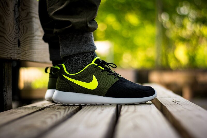 Person Wearing Sneakers — Black, Natural