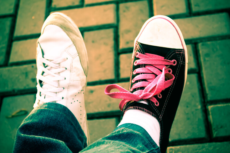 Person Wearing Sneakers — Green