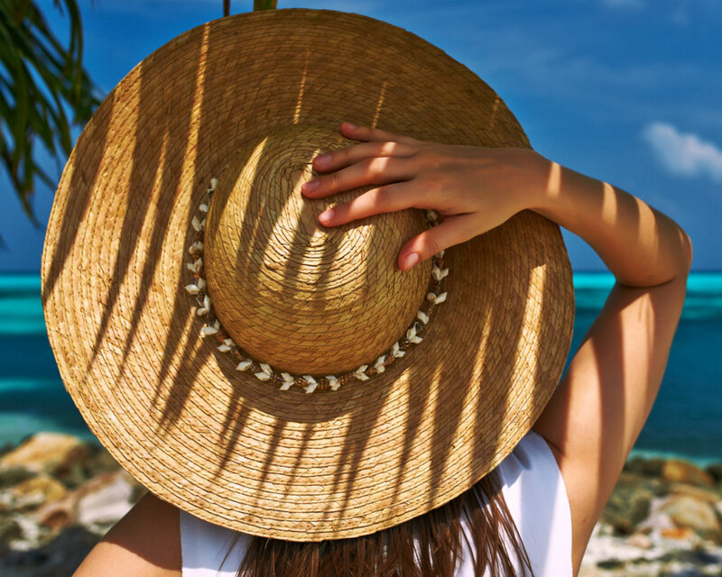 Person Wearing Straw Hat — Blue