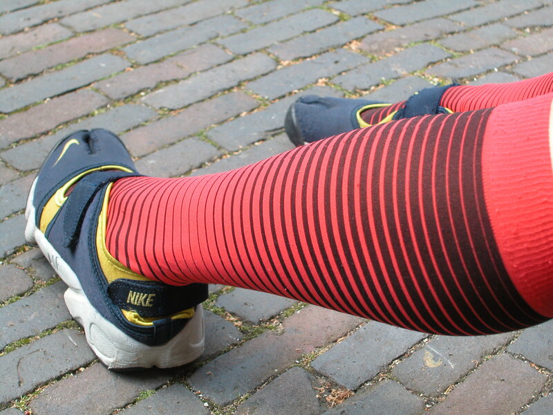 person wearing striped socks and shoes