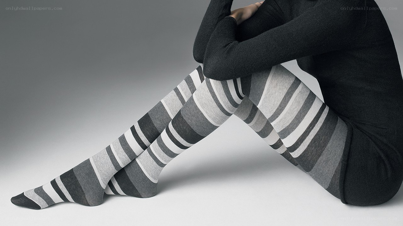 person wearing striped tights