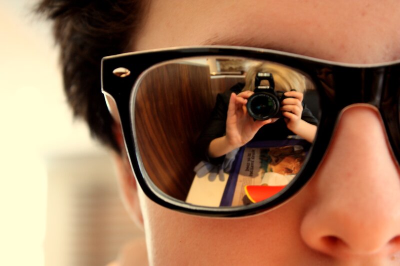 Person Wearing Sunglasses — Black, Curious