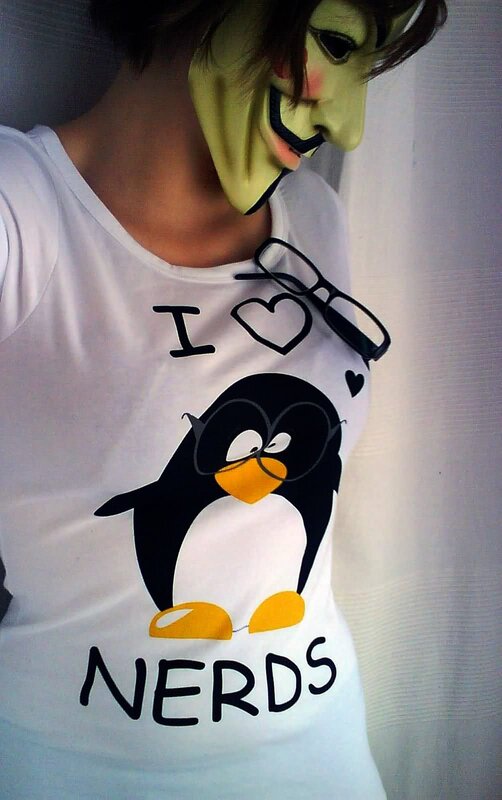 person wearing t-shirt with penguin