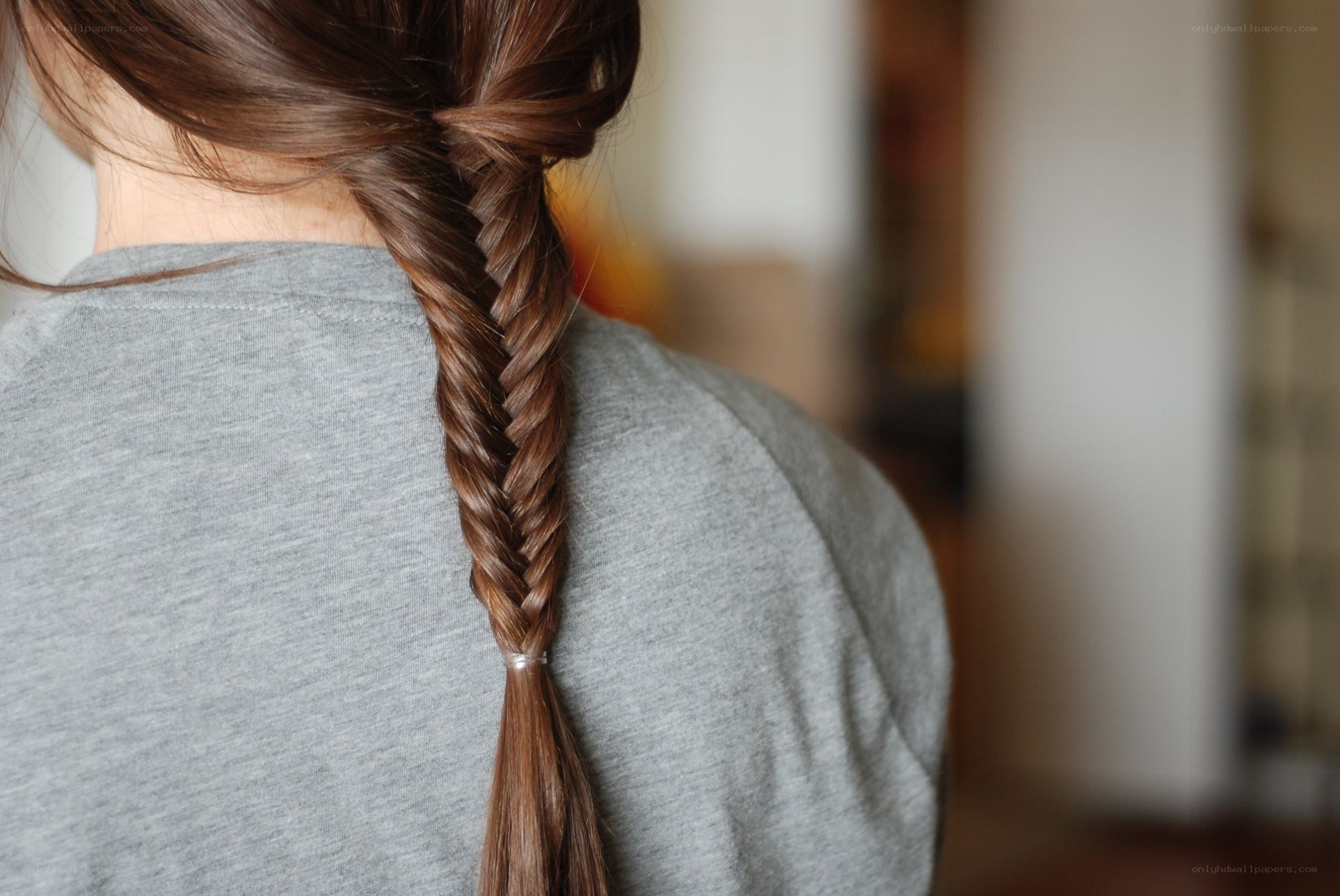 person with a braid hairstyle